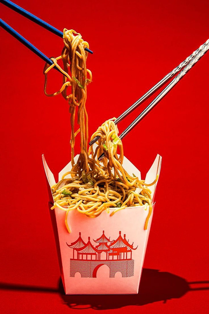 Chinese Restaurants creative ad: Noodles form dramatic red product silhouette