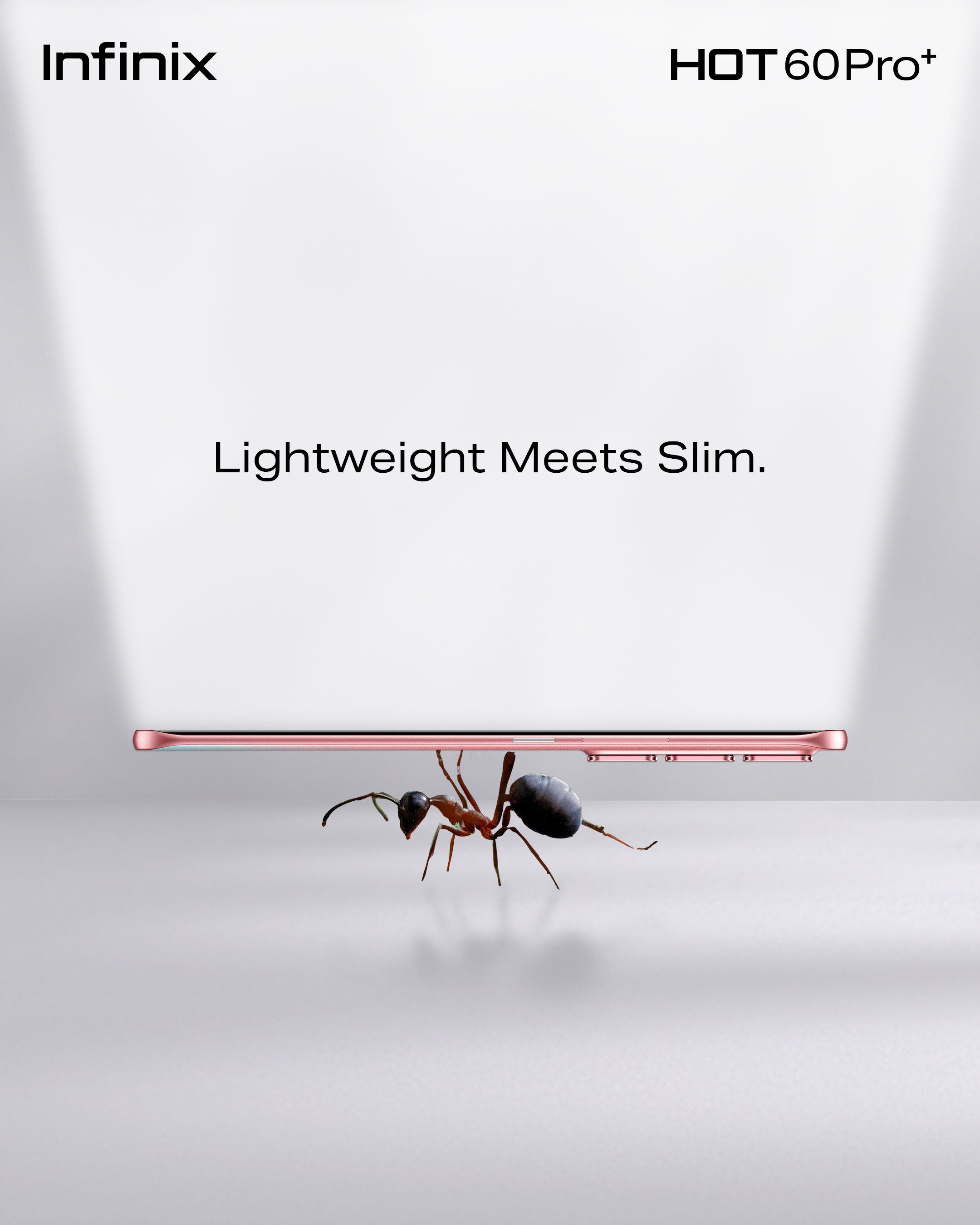 Instagram post: An ant carrying an ultra-slim pink smartphone seen edge-on