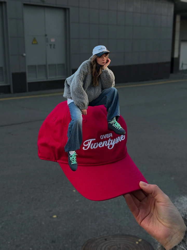 Hats & Caps creative ad: Giant cap becomes surreal seating