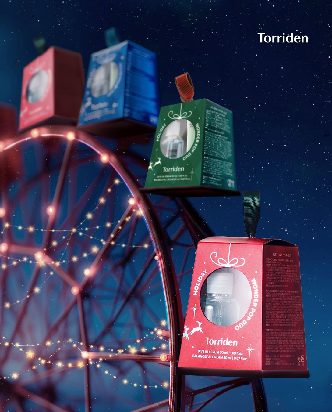 Christmas Instagram post: Holiday gift-set boxes riding as gondolas on a lit Ferris wheel at night
