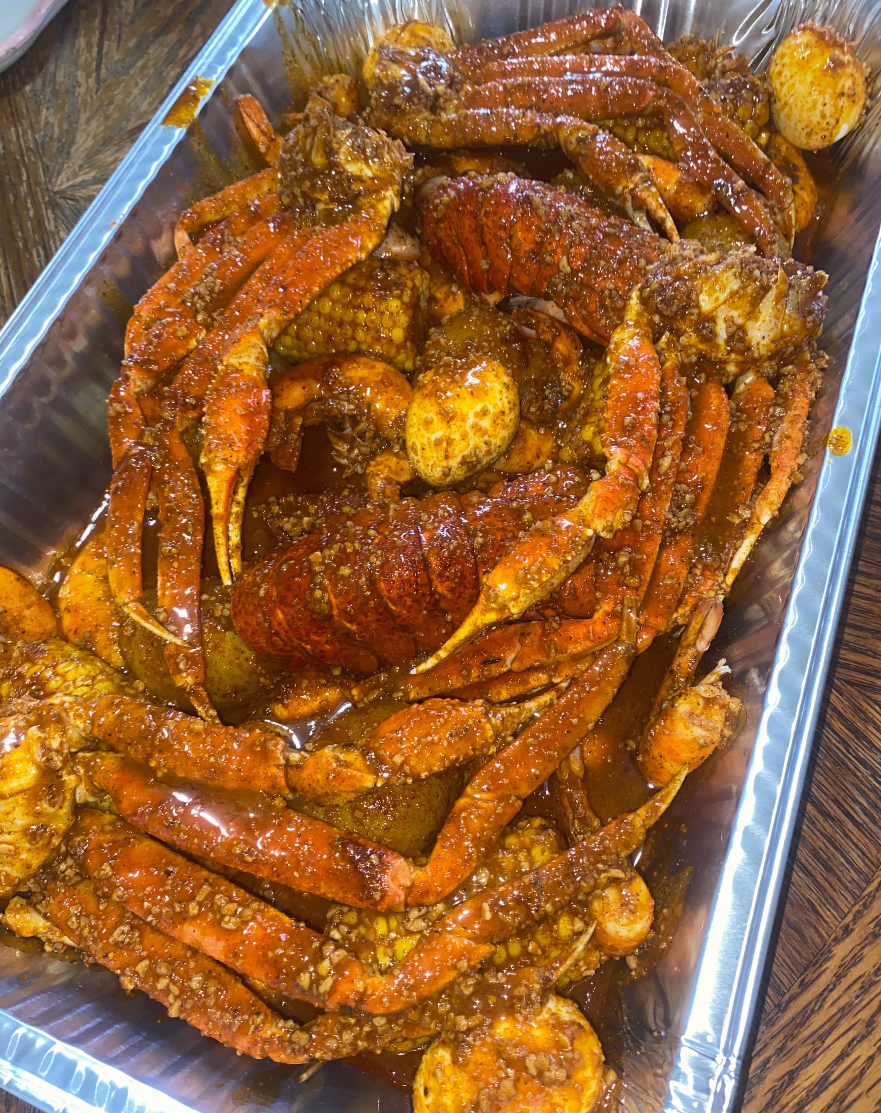 Instagram post: Street poster dramatizes overflowing seafood boil, slide 7