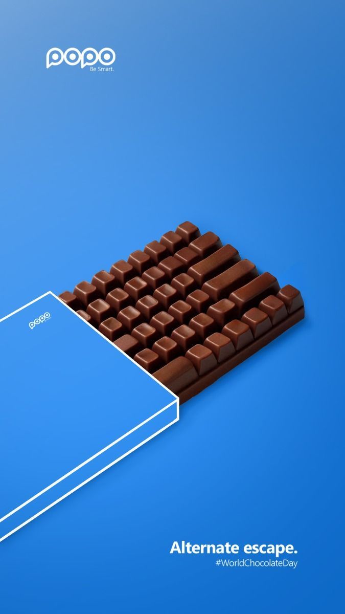 other-festival Story: Chocolate bar shaped like a keyboard sliding out of a wrapper