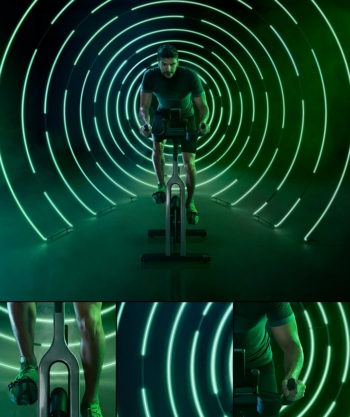 Gym & Fitness creative ad: Focused cyclist riding an indoor exercise bike