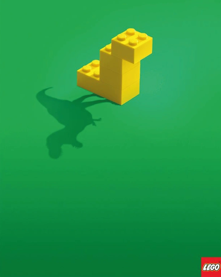 Toy Stores creative ad: Simple yellow brick stack casting a T-rex shadow