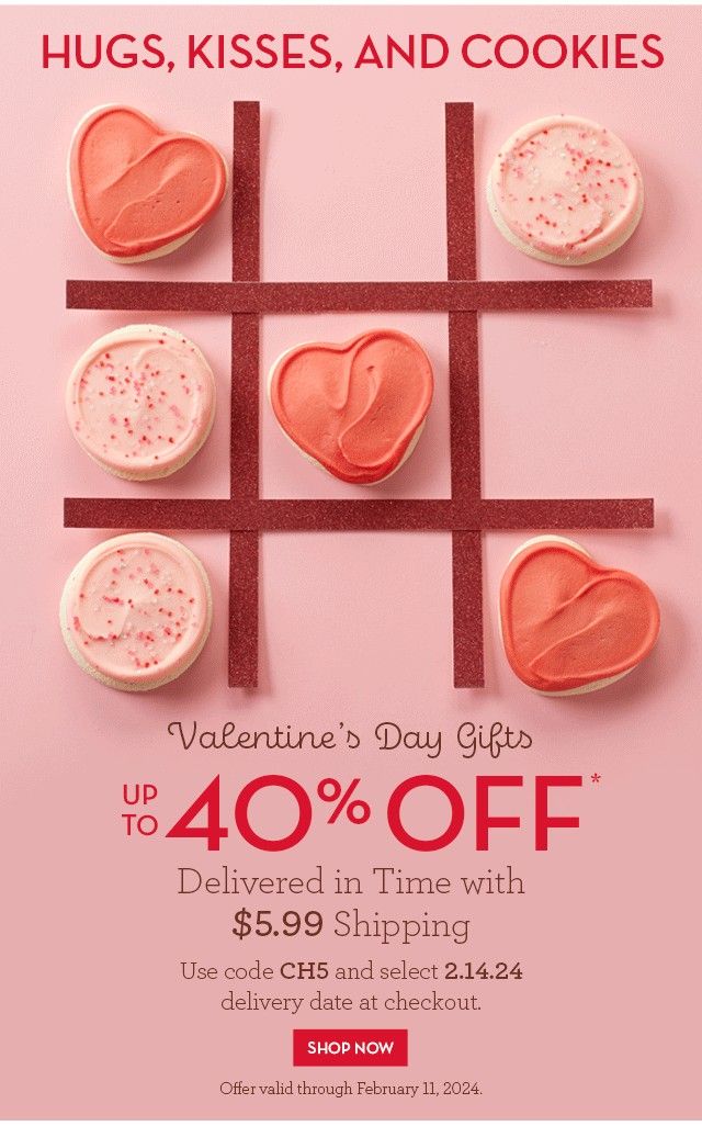 Frosted heart and round cookies on a glitter tic-tac-toe grid