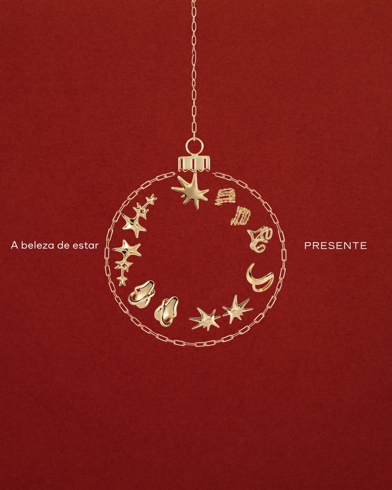 Christmas bauble outline made of gold chain and charms