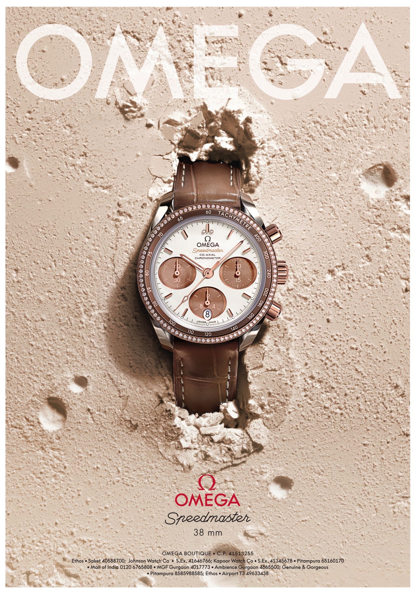 Poster: Diamond-set rose gold chronograph breaking out of a sand-coloured plaster wall