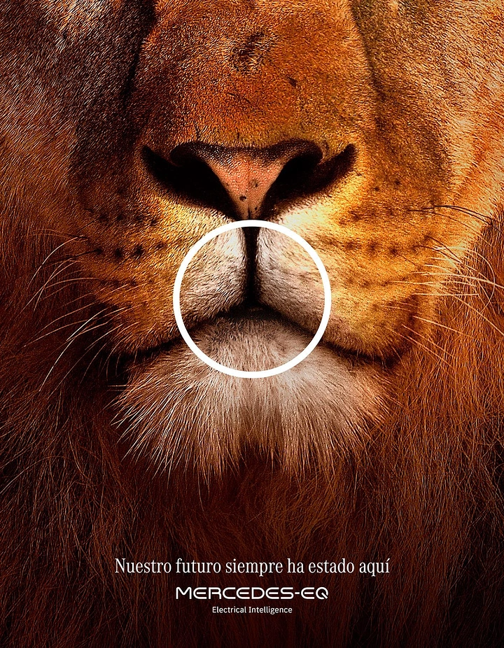 Automotive creative ad: Extreme close-up of lion muzzle framed by white circle