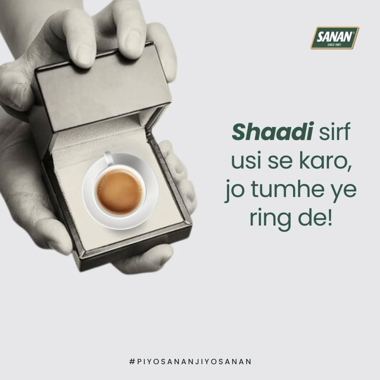 Instagram post: Hands opening a ring box that holds a cup of chai
