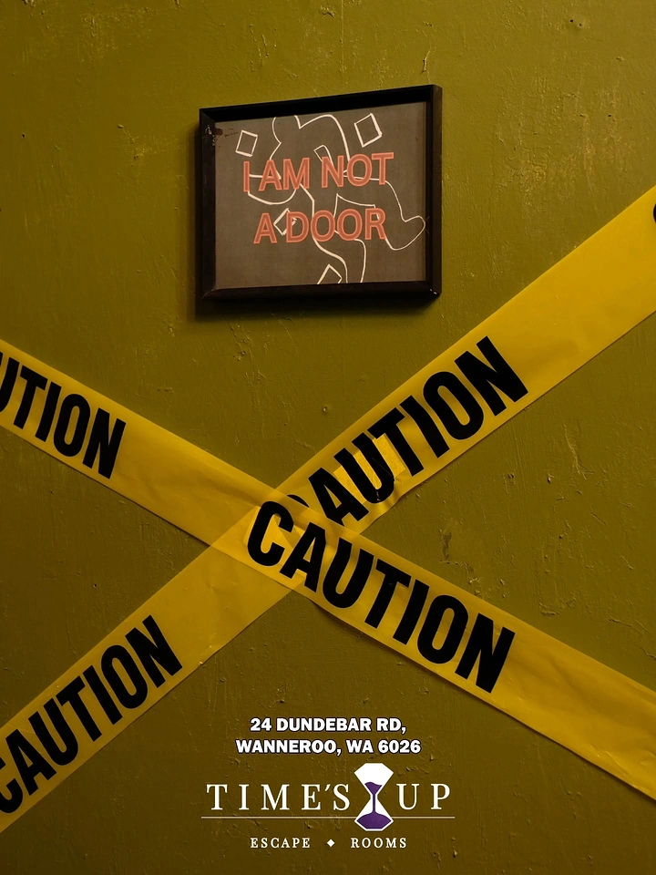 Escape Rooms creative ad: Door pun reinforced with caution tape
