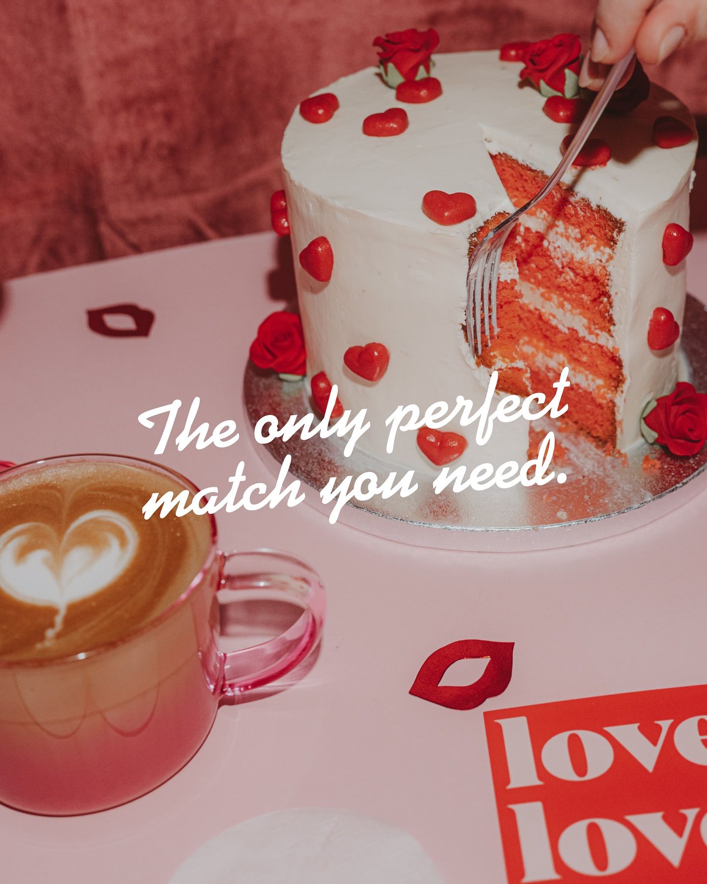 Valentine's Day Instagram post: Red velvet layer cake with heart decorations and heart latte