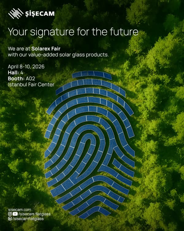 Aerial view of solar panel rows arranged into a fingerprint in a forest