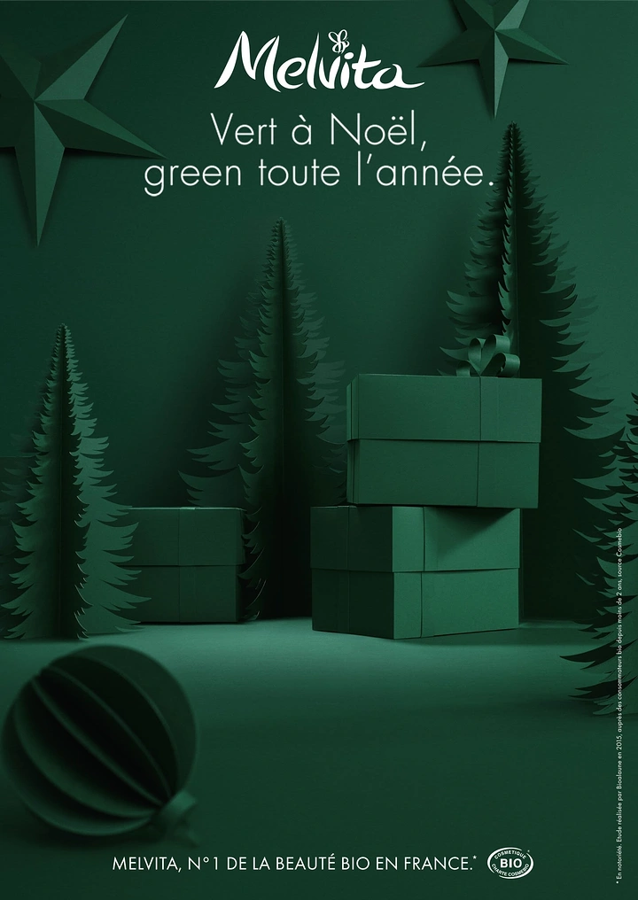Christmas creative ad: Monochrome green paper-craft Christmas scene with stacked gifts