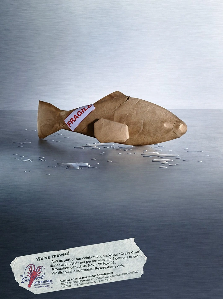 Seafood Restaurants creative ad: Fish packaged as fragile parcel metaphor