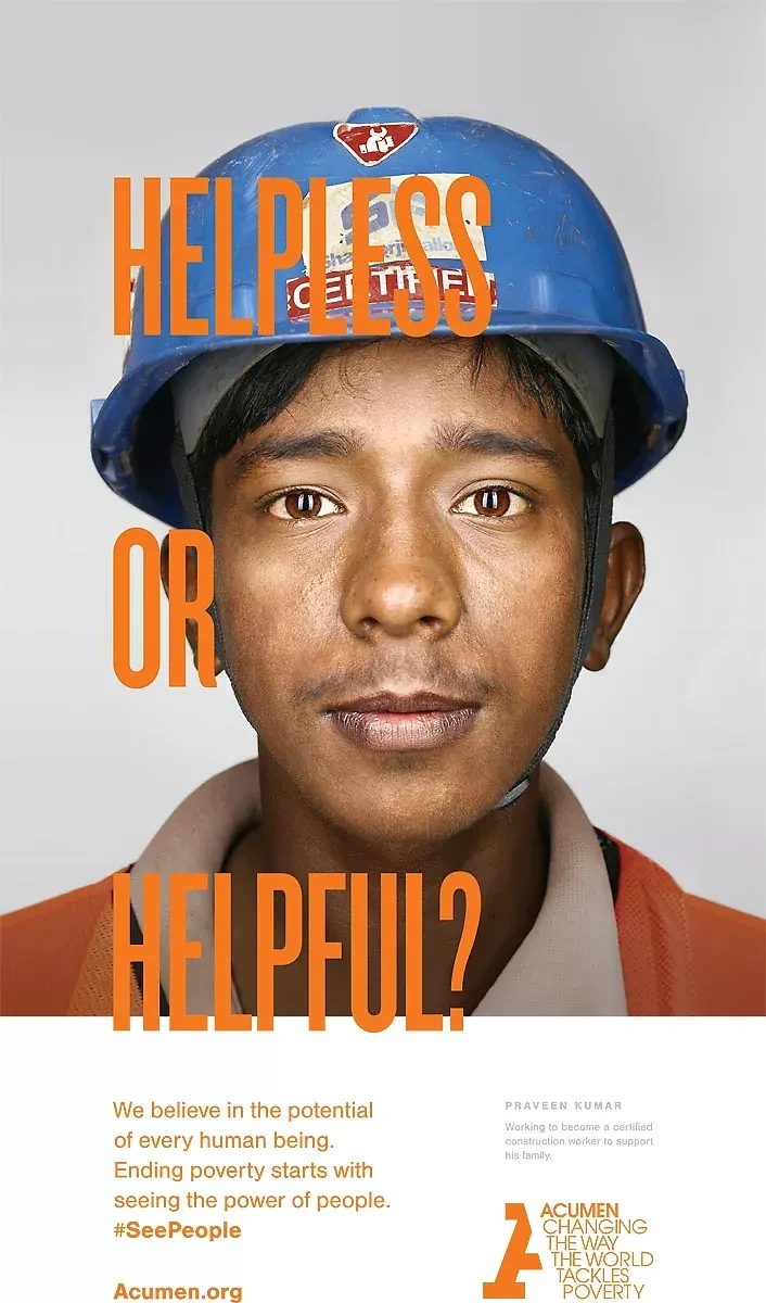 Creative ad: Tight portrait of a young construction worker in a blue hard hat