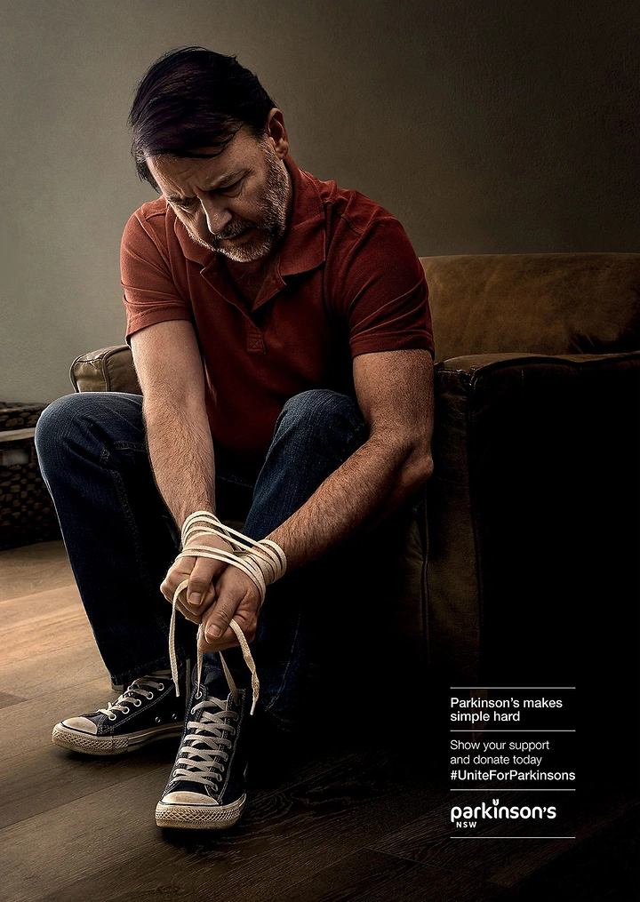 Pain Relief Brands creative ad: Tied shoelaces visualize Parkinson's symptom