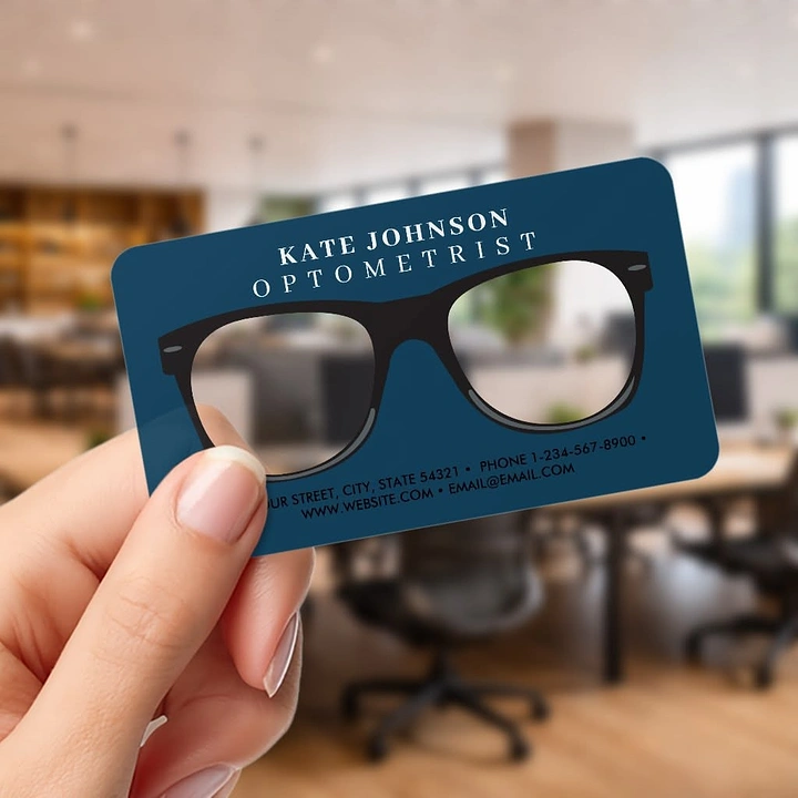 Opticians & Eye Care creative ad: Business card with die-cut glasses lenses