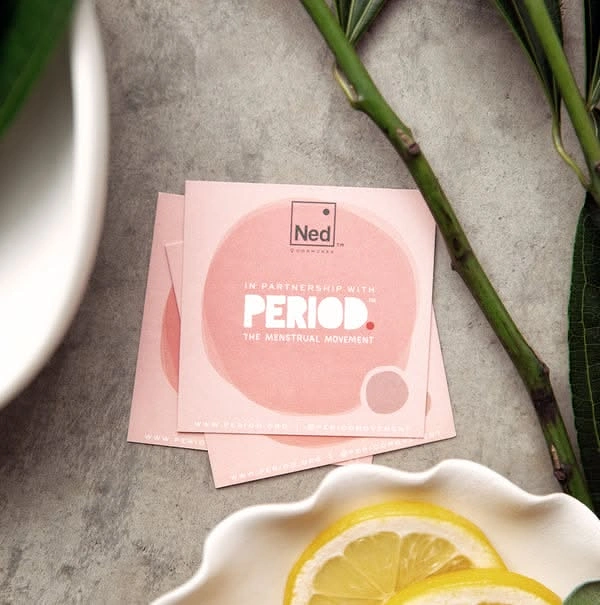 Period Care & Feminine Hygiene creative ad: Staged photo of printed cards
