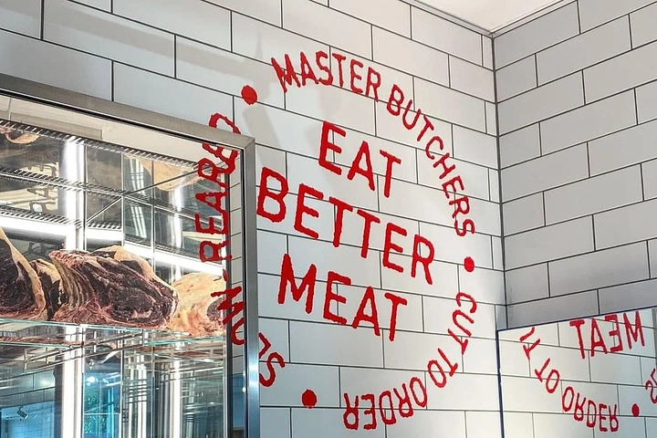 Meat & Seafood Shops creative ad: Physical typography wraps around butcher shop