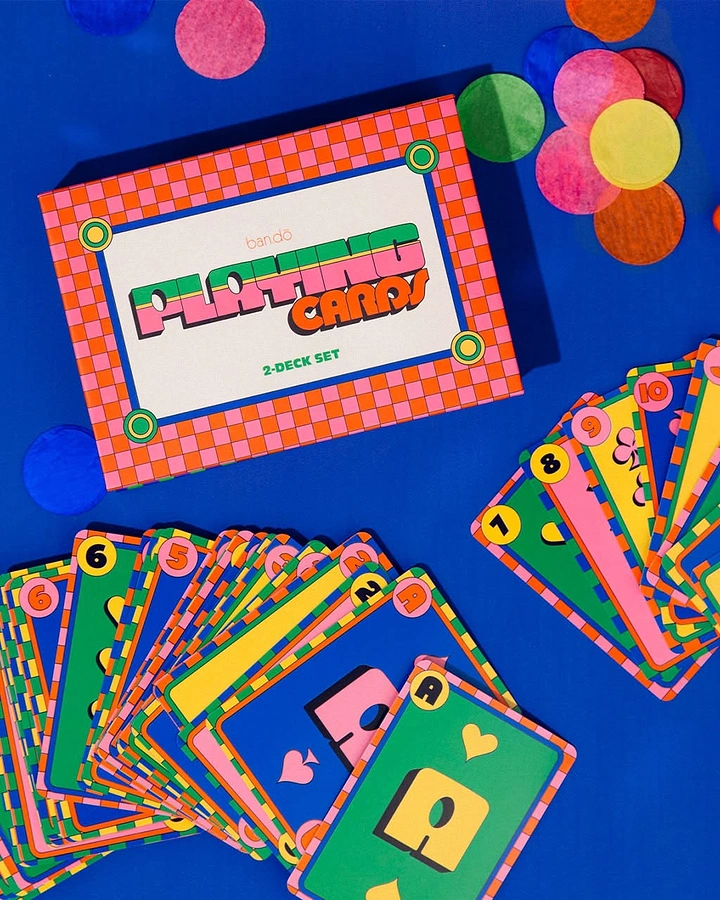 Board Games & Game Cafes creative ad: Colorful cards form playful tabletop scene