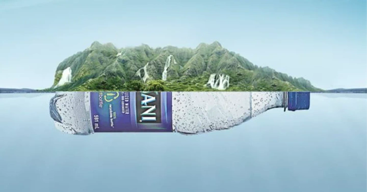 Packaged Drinking Water creative ad: Landscape appears inside floating bottle