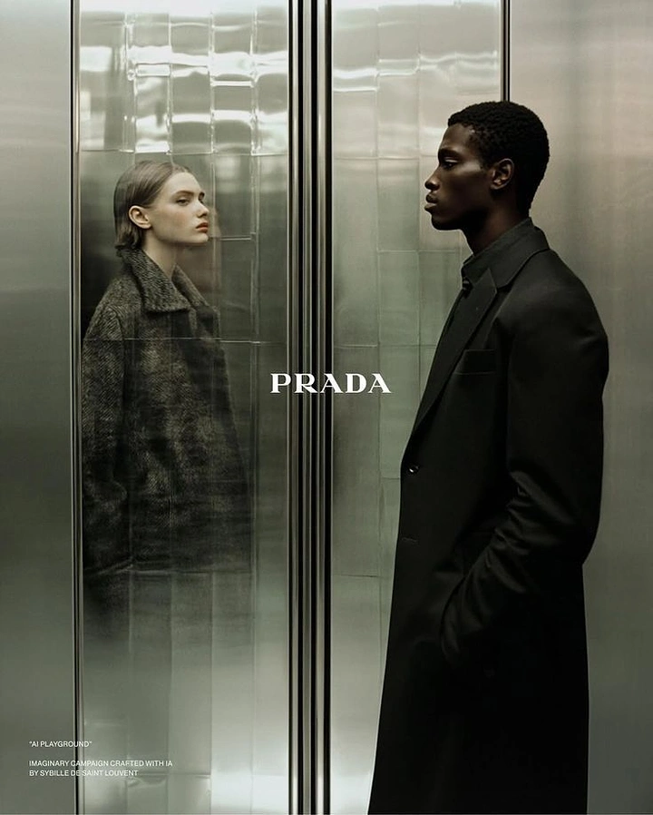 Creative ad: Man in black coat facing woman's reflection in steel elevator