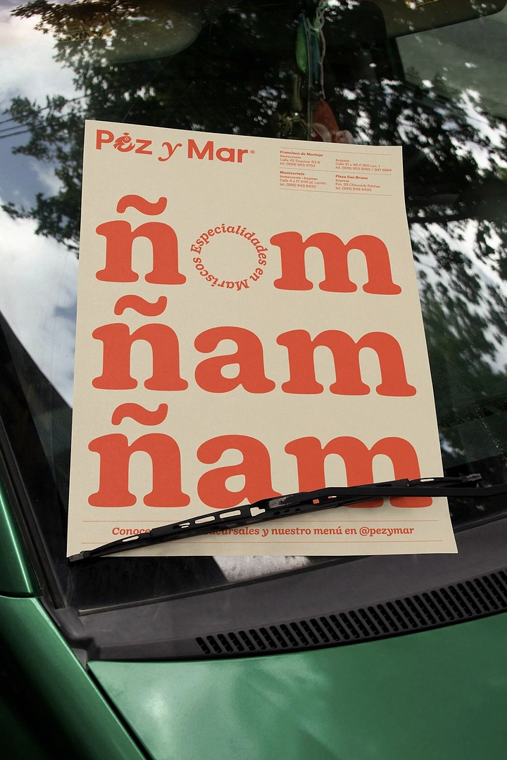 Seafood Restaurants creative ad: Playful oversized ñam ñam typography