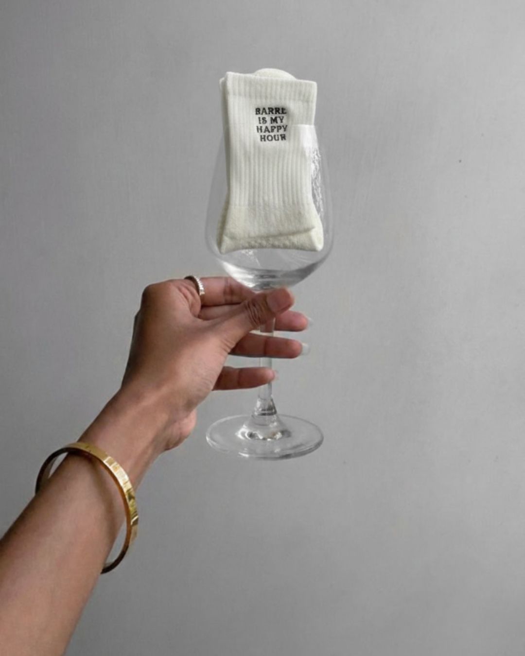 Instagram post: Sock presented as a wine-glass object, slide 2