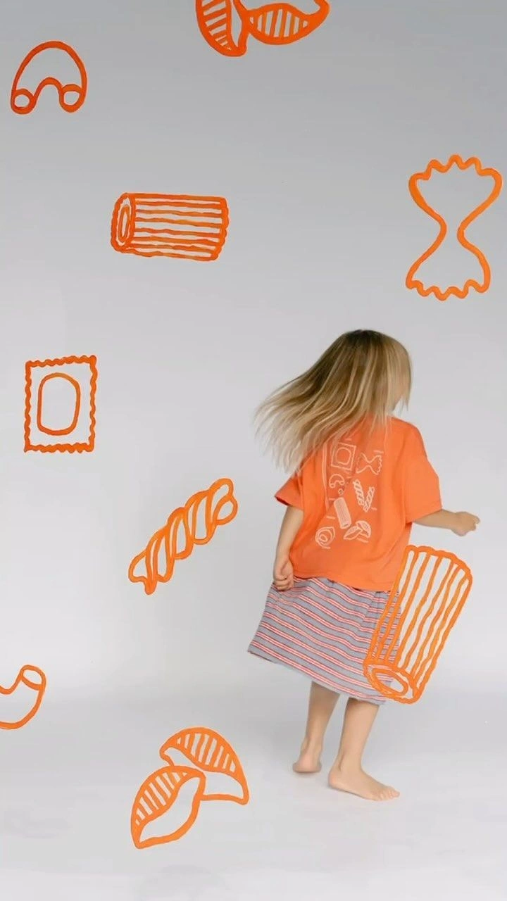 Kids Clothing creative ad: Pasta doodles echo pasta-print tee