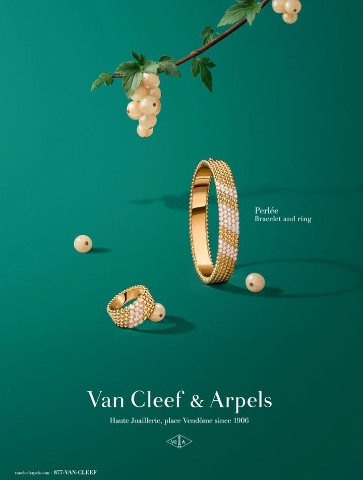 Jewellery creative ad: Beaded gold and diamond bangle and ring on emerald green with white currants