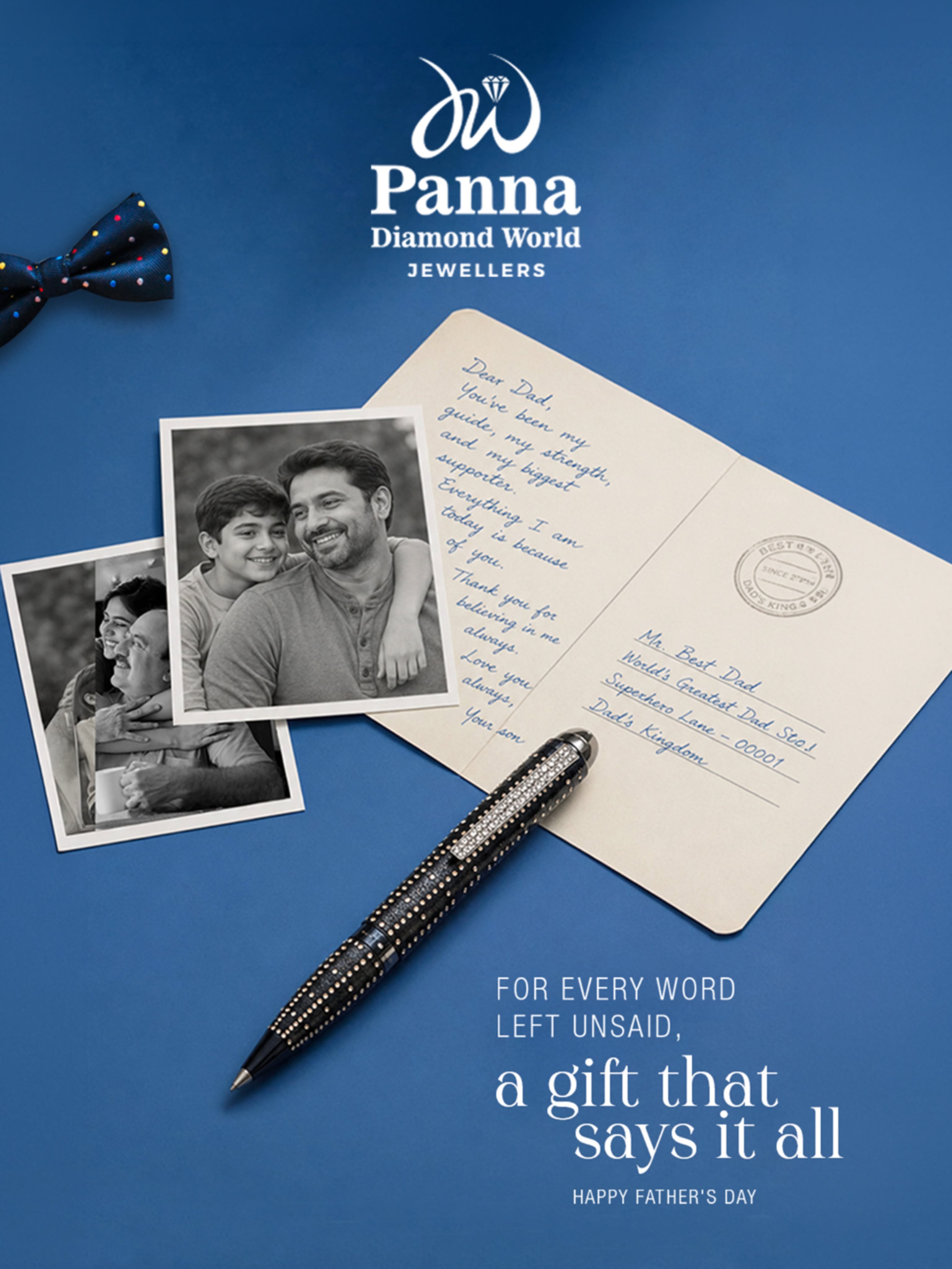 Diamond-studded pen resting on a handwritten postcard to Dad with family photos