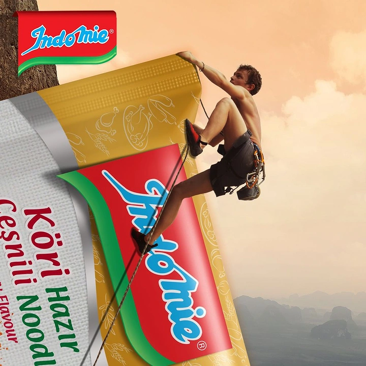 Instant Noodles & Pasta Brands creative ad: Surreal oversized Indomie package scene