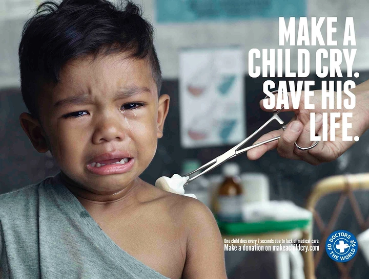 Creative ad: Crying boy getting his shoulder swabbed with forceps
