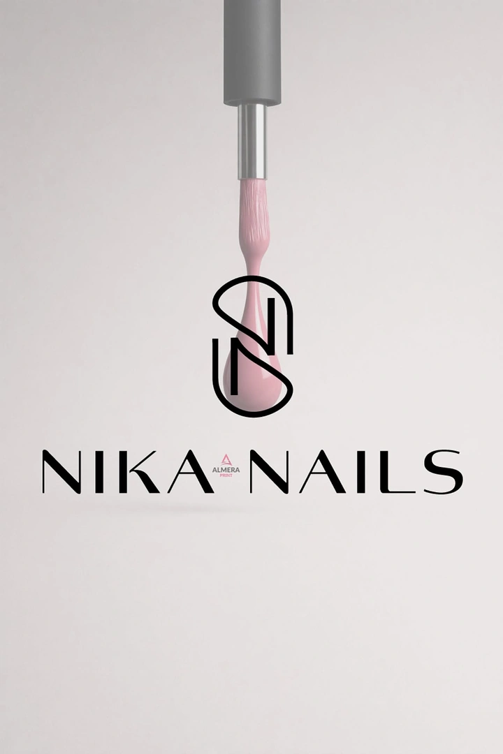 Nail Salons creative ad: Polish brush paints the monogram