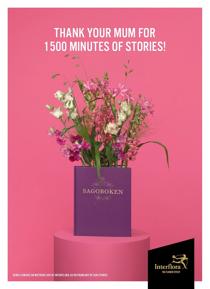 Mother's Day creative ad: Flower bouquet growing out of a purple storybook on a pedestal