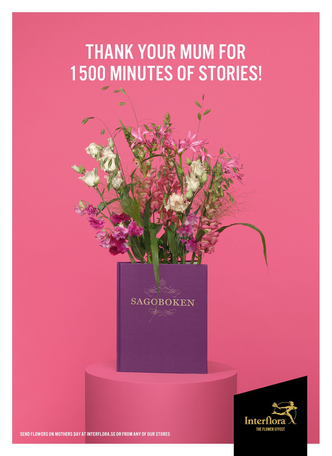 Flower bouquet growing out of a purple storybook on a pedestal