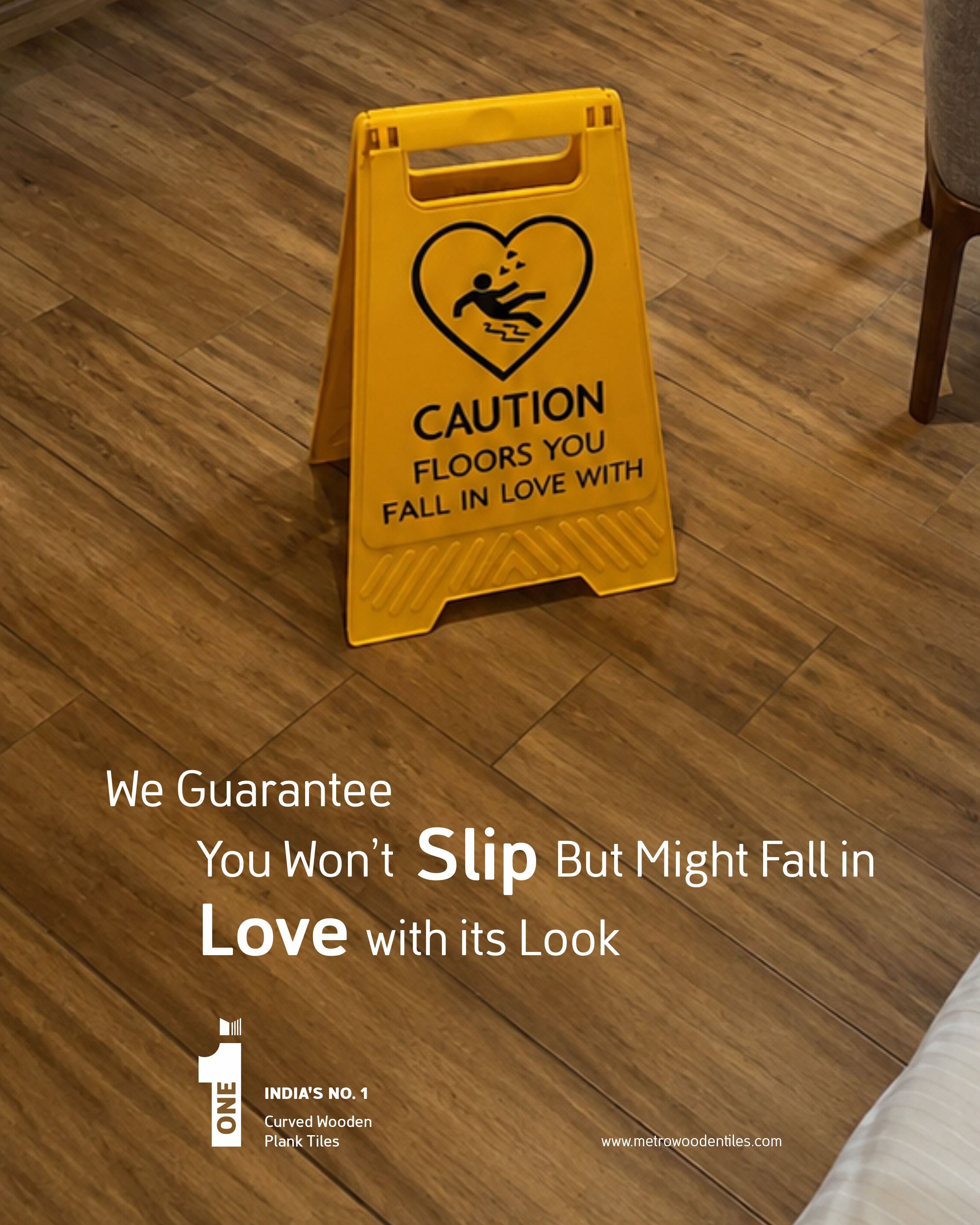 Carousel: Yellow wet-floor caution sign on wood-look tiles, slide 1