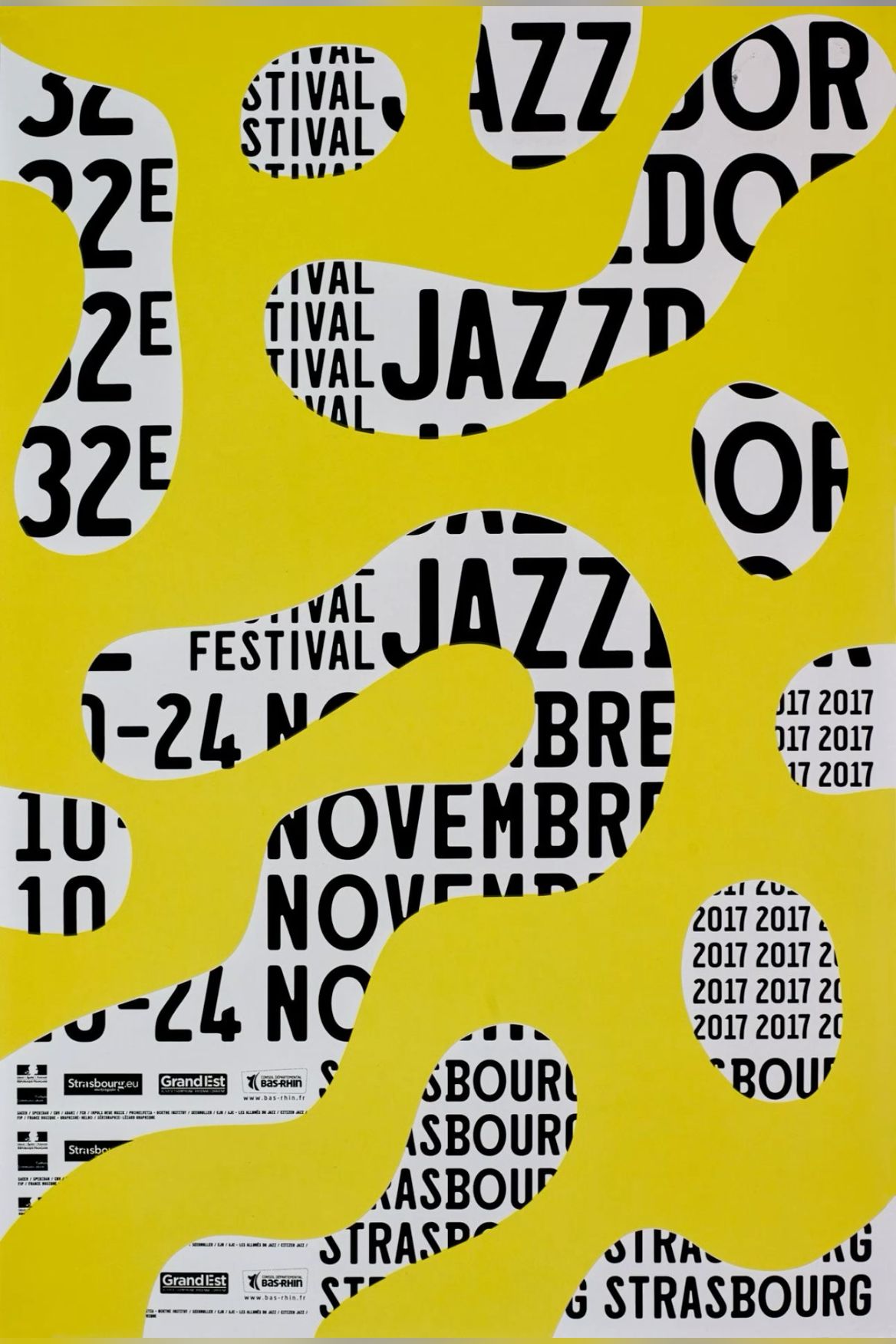 Poster: Repeated festival typography seen through blob-shaped holes in a yellow layer