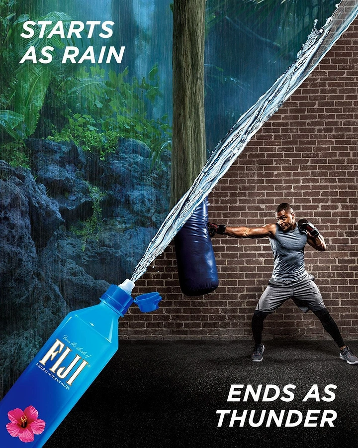 Packaged Drinking Water creative ad: Bottle spraying a water jet that splits rainforest scene from boxer at gym wall
