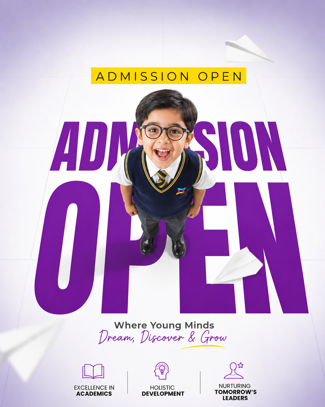 Carousel: Top-down shot of an excited schoolboy in uniform standing on giant purple lettering, slide 1