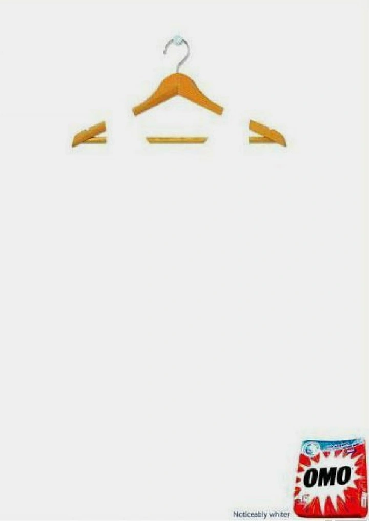 Laundry & Dry Cleaning creative ad: Hanger with pegs forms a smile