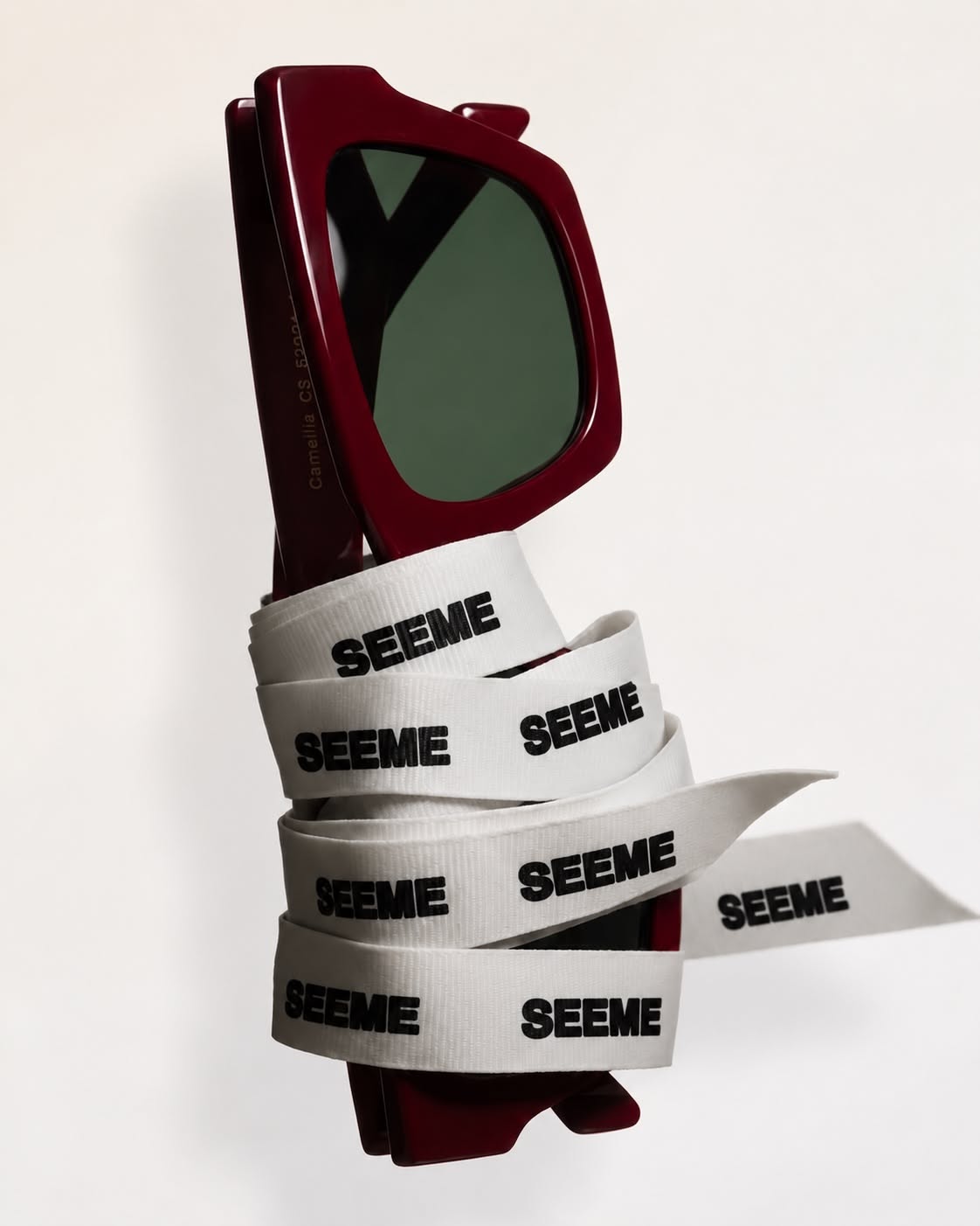 Instagram post: Sunglasses transformed into branded tape sculpture