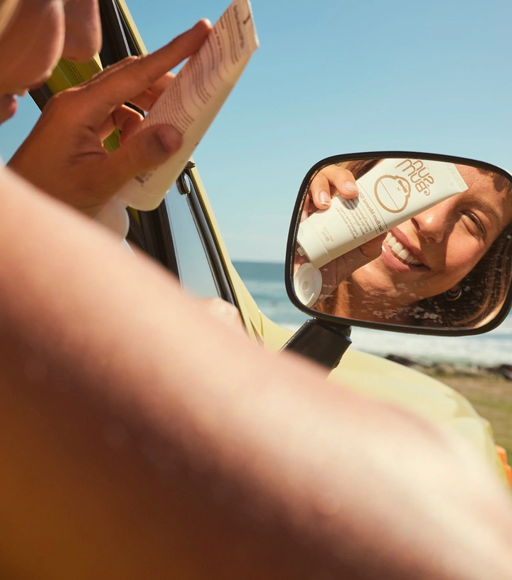 Sunscreen & Sun Care creative ad: Car mirror creates clever sun-care reflection