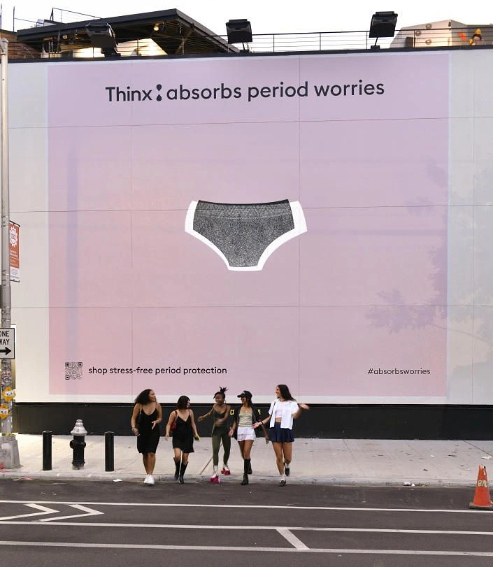 Period Care & Feminine Hygiene creative ad: Large-scale underwear absorbs worries metaphor