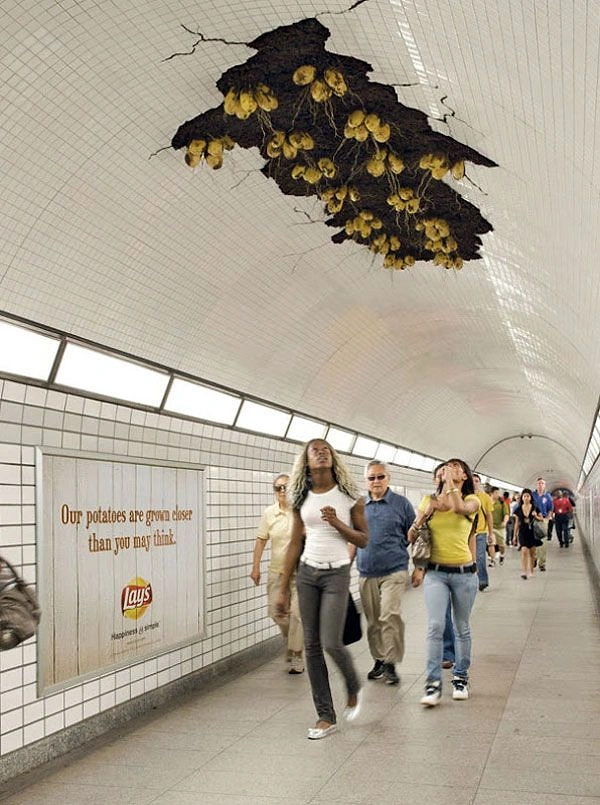 Snacks & Namkeen Brands creative ad: Potatoes sprouting through subway ceiling ambient ad