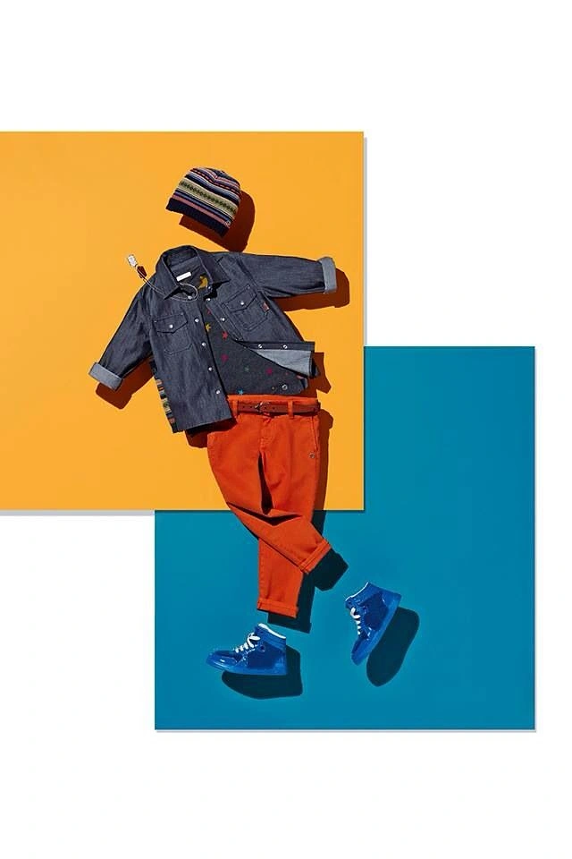 Kids Clothing creative ad: Invisible-kid outfit on color blocks
