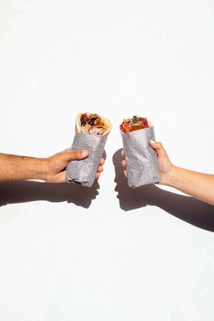Arabic & Middle Eastern Restaurants creative ad: Wraps cleverly replace a celebratory toast