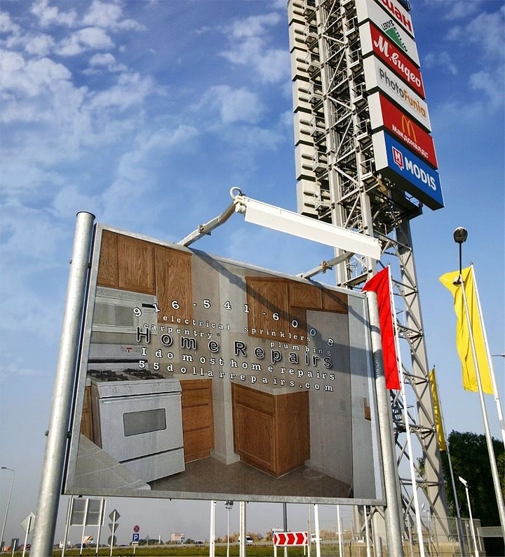 Carpenters & Woodwork creative ad: Real kitchen cabinets built into billboard
