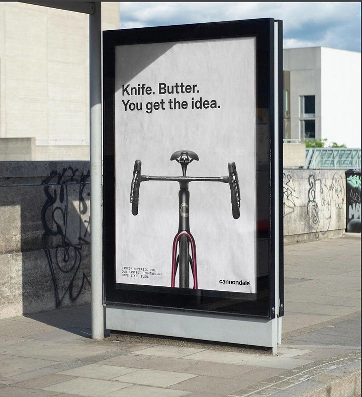 Bicycle Shops creative ad: Head-on view of a black aero race bike