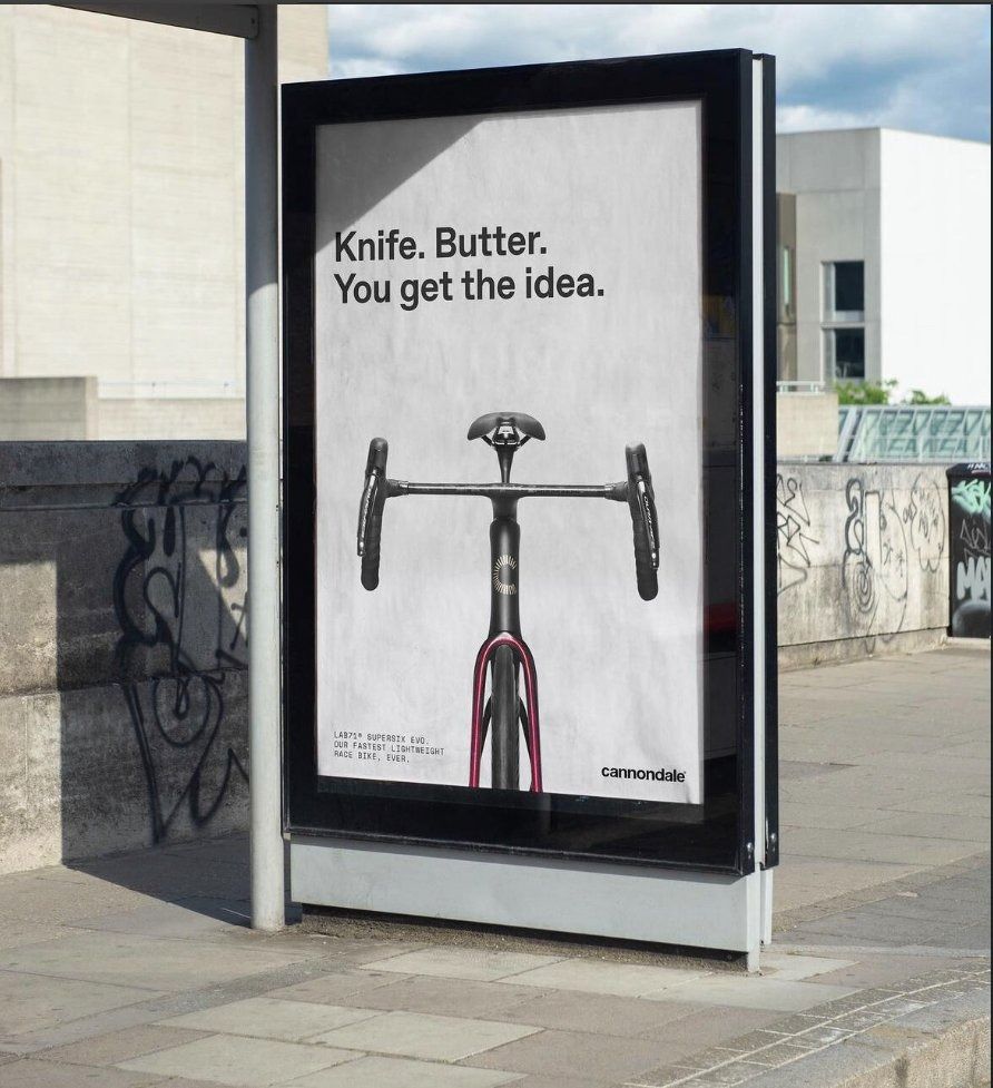 Poster: Head-on view of a black aero race bike